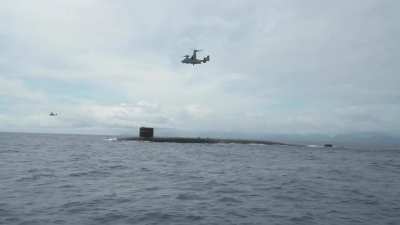 MV-22B Osprey attached to the "Lucky Red Lions" of Marine Medium Tiltrotor Squadron (VMM) 363, delivering a payload to the Ohio-class ballistic-missile submarine USS Henry M. Jackson (SSBN-730) on October 21 2020.