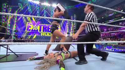 Ronda rousey disrespecting Liv morgan, stepping on her with the championship belt in her hands