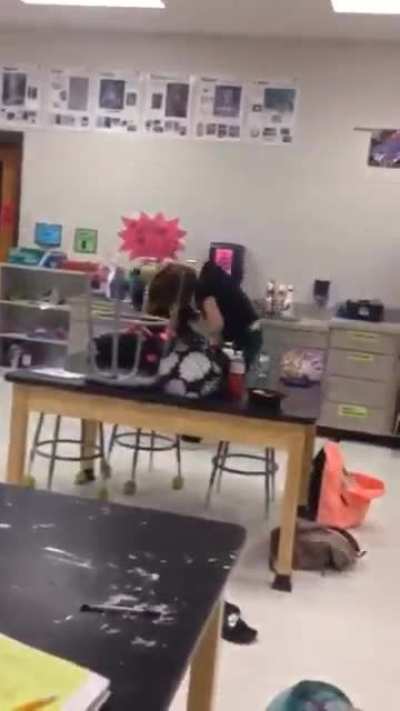 Girls brawl in classroom, one gets whooped