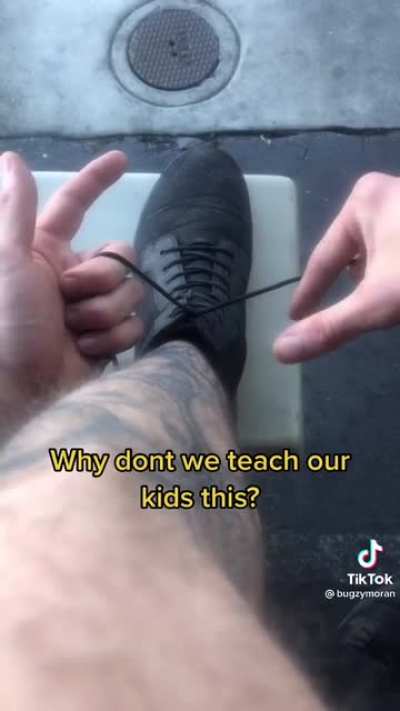 Tying his shoes in a second