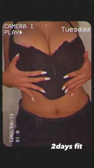 Weighing her bust