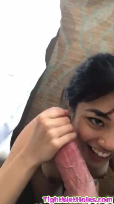 Asian girl play with a thick veiny cock