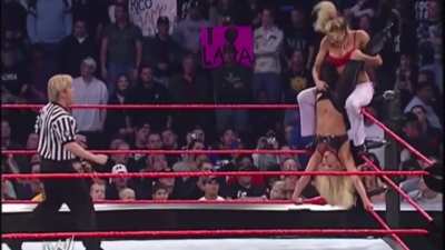 Stacy trying to remove Trish Stratus&rsquo;s tights among others! 
