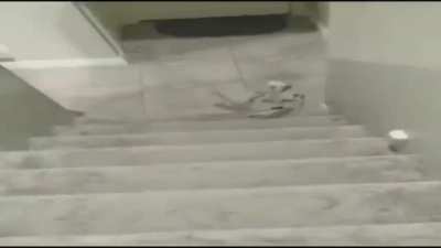 down the stairs I go