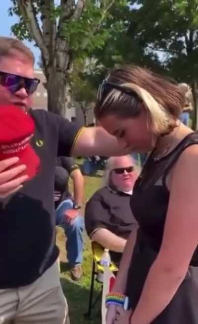 Proud Boy with MAGA hat saying a &lsquo;Patriot Prayer&rsquo; with student about to attempt to enter school in Vancouver, WA without a mask in defiance of policy. This is next level cringy.