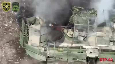 The 28th Mechanised Brigade us a fpv drone to strike a russian BTR-82A with crew on top.