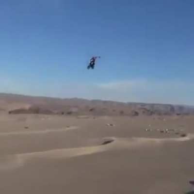 This stunning transition of motorcycle to parachute is incredible!