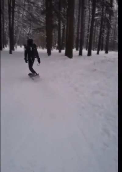 This guy snowboards uphill