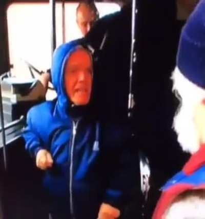 The guy wanted to help the "child" get on the bus