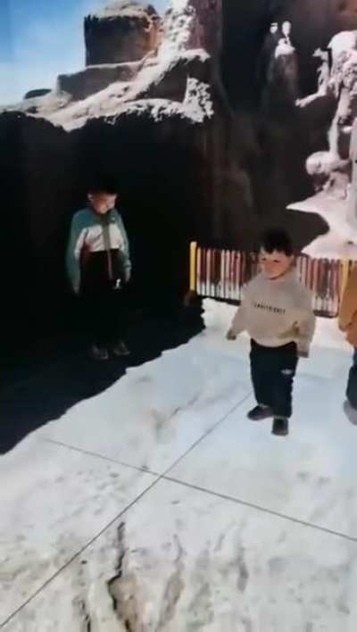 The Vection Illusion at work, fast-moving visuals trick the brain into losing balance&mdash;causing these kids to fall instantly.