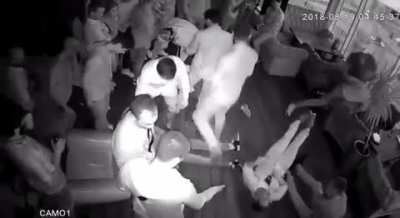 A drunk guy fights everyone in the bar