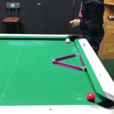 A pro pool player in action