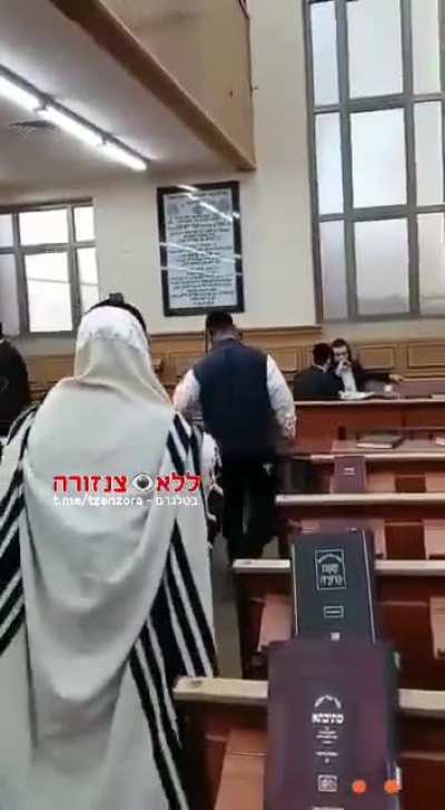 A member of Neturei Karta is assaulted at a synagogue for participating in a demonstration in support of Palestinian rights