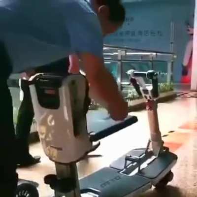 suitcase turned into a scooter