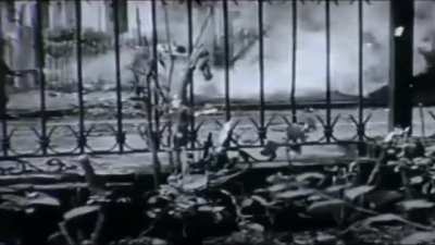 A U.S. Army soldier uses a flamethrower to burn out a Japanese pillbox during fierce fighting in the city of Manila, Philippines (February 1945)