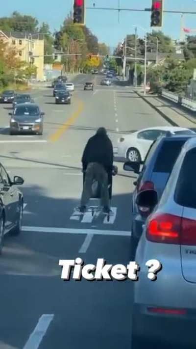 Move aside Cyclists! There is a New King in Seattle for running red lights: the shopping cart riding caravan raiders!