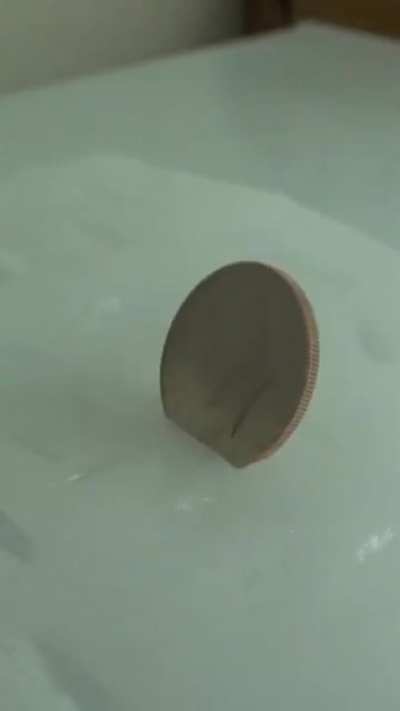Coins Flapping Like Butterflies by Sticking Them in Dry Ice.