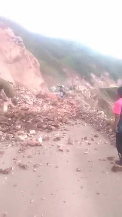Per&uacute;: chaman witch tries to stop a land slide with superior power. 
