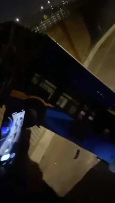 In the Bronx, NY, a bus is hanging off a bridge after an accident