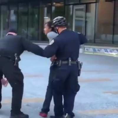 Woman arrested for attacking an Asian couple in San Francisco spits on cops