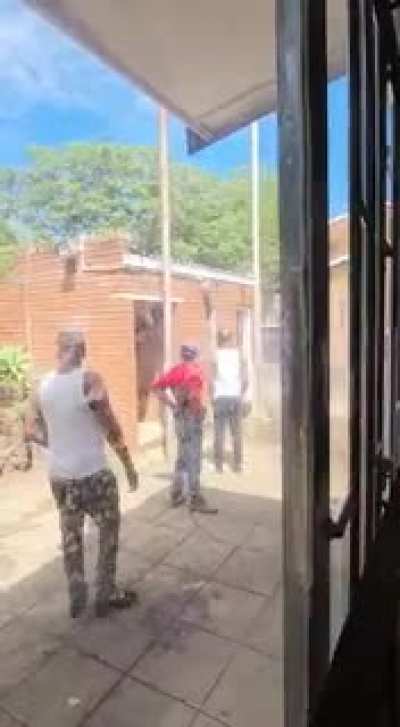 Attempt hijack 4. Hi jackers standing outside police station calling for them to come out.