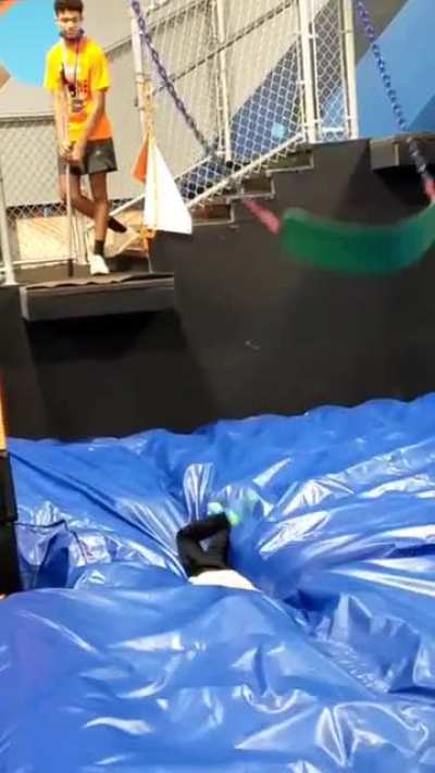 First dismount from moving swing