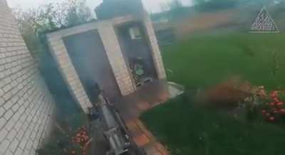 Ukrainian soldier pre-firing at a Russian soldier hiding in a toilet in a town east of Kupyansk. (Early War)