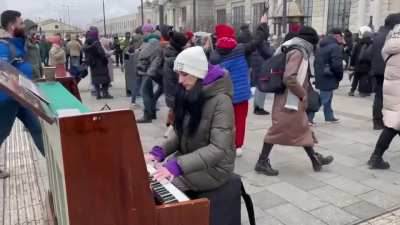 Outside Lviv station, which is thronging with exhausted refugees fleeing war in eastern Ukraine, an accomplished pianist is playing &ldquo;What a Wonderful World.&rdquo; It&rsquo;s hauntingly beautiful.