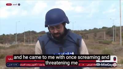 Israeli Policeman Threatens and Intimidates a Reporter Live On-Air and Demands that he "not say anything bad."