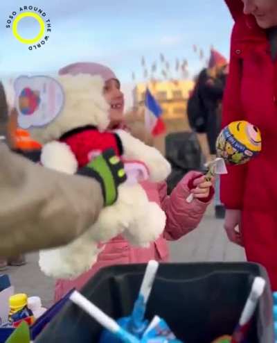 at polish border volunteers are working hard to make the Ukrainian kids happy!