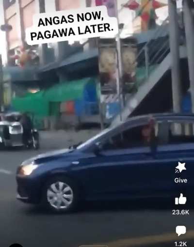 Giving the finger while driving through an intersection