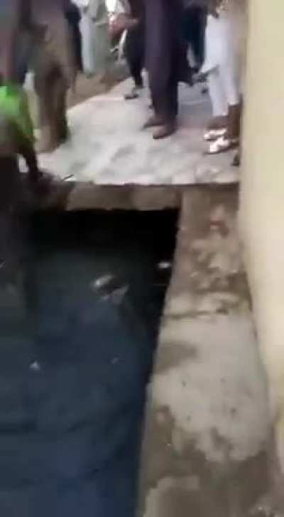 Food shortage leds to food war in pakistan. People are throwing each other in sewage.