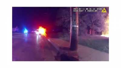 25 yo pizza delivery man runs into burning house, saves four children who tell him another might be in the house. He goes back in, finds the girl, jumps out a window with her, and carries her to a cop who captures the moment on his bodycam