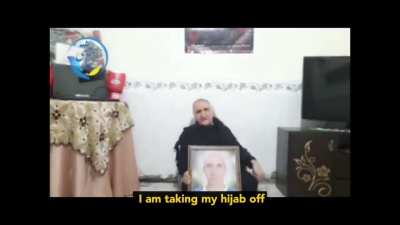 After "80 years," an Iranian woman removed her hijab in solidarity with the youth of Iran protesting for their rights in the streets. Her son Sattar Beheshi was an Iranian blogger who was killed by the cyber police in 2012