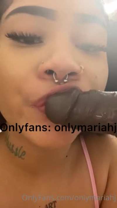 Sucking the dildo