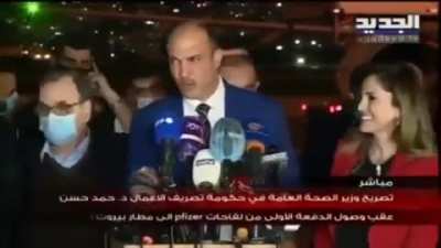 The Lebanese minister of Public health talking about the covid vaccines, coughs, and then takes off his mask to continue coughing