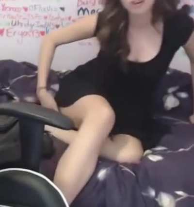 Poki laying on her bed in a cute dress, you can see her panties 😇