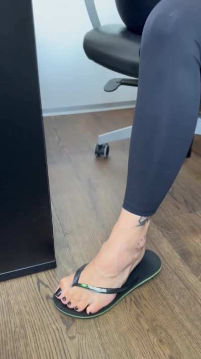 Is it the flip flops or the toe nails that are distracting you from your work?