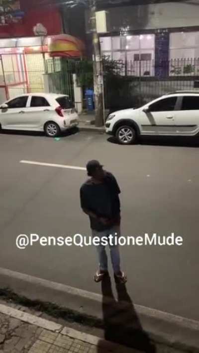 Girls stars filming a hobo when suddenly, he starts singing.