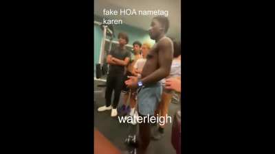 Woman puts on homemade "HOA" name tag and starts harassing people in community gym 
