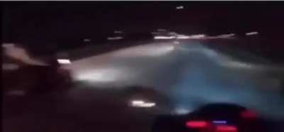 Motorcyclists speed on the freeway
