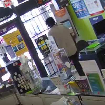 Store Manager locks robber inside until police arrives