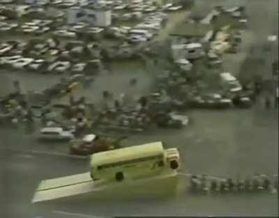 Daredevil Jimmy &ldquo;The Flying Greek&rdquo; Koufos jumps 20 motorcycles in a school bus (1980)