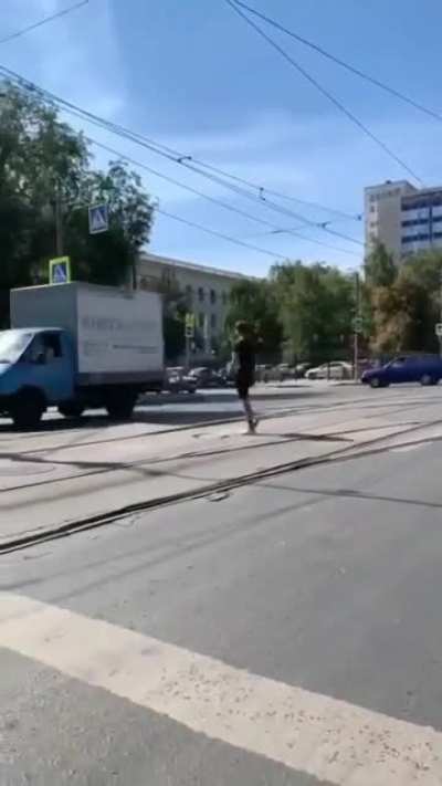 Cool kid stopped on the crosswalk, Chad walks over