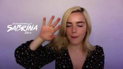 Kiki Plays With Her Hair