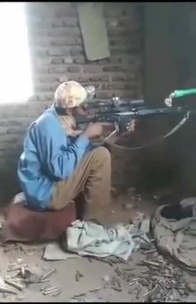 Sudanese volunteer sniping RSF militiamen in Khartoum 