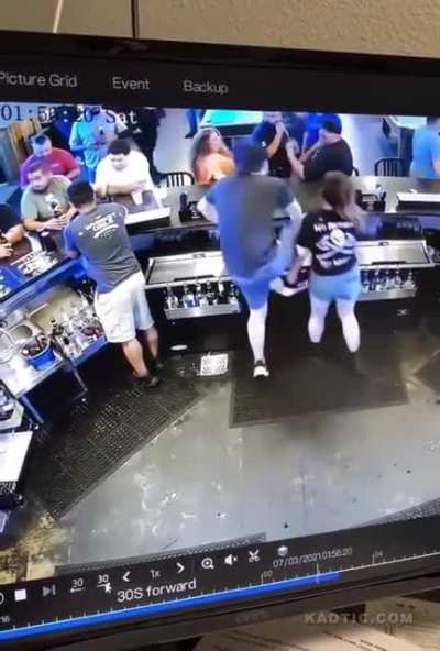 Bartender keeping it tidy, knocking out a customer.