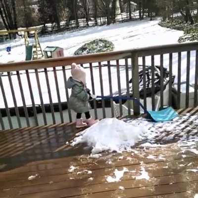 Shovelling the porch.