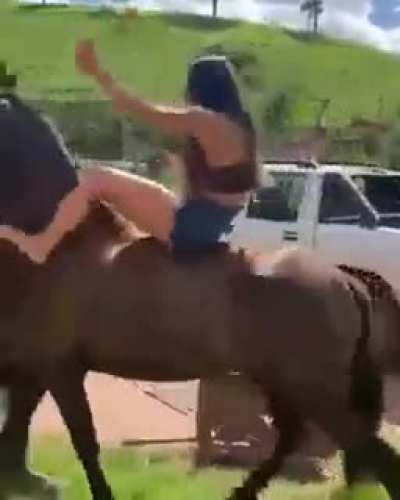 trying to ride a horse