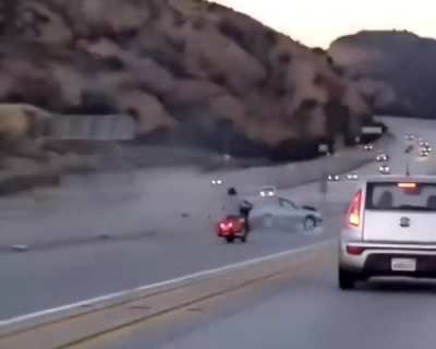 Instant mayhem! Who&rsquo;s at fault here? Biker or the car? 